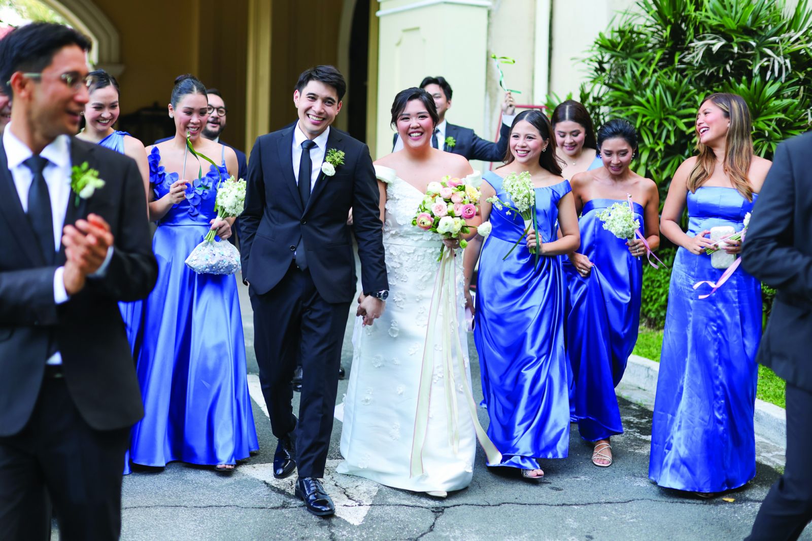 The newlyweds with their entourage