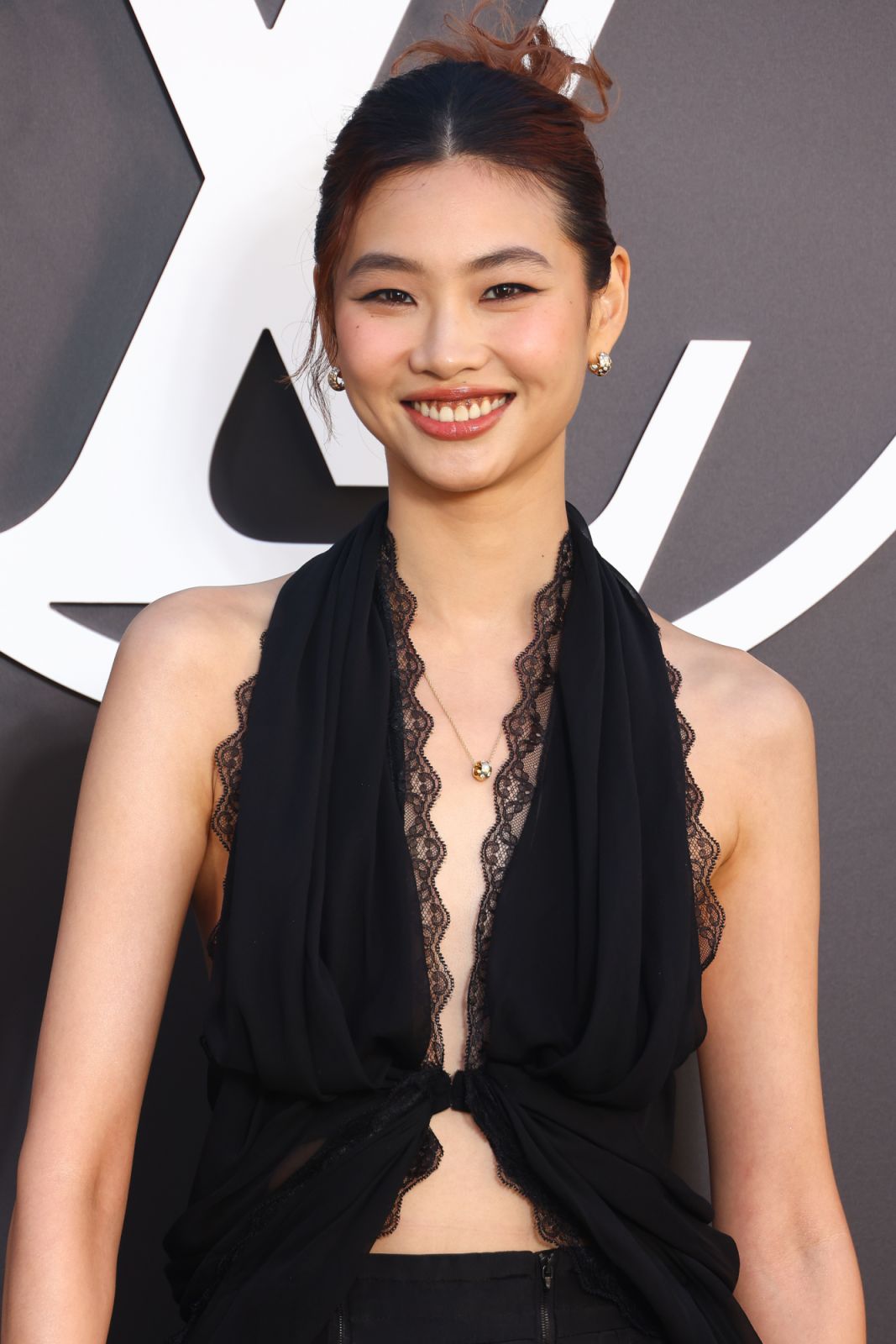 PARIS, FRANCE - OCTOBER 01: (EDITORIAL USE ONLY - For Non-Editorial use please seek approval from Fashion House) Hoyeon attends the Louis Vuitton Paris Womenswear Spring-Summer 2025 show as part of Paris Fashion Week on October 01, 2024 in Paris, France. (Photo by Marc Piasecki/WireImage)