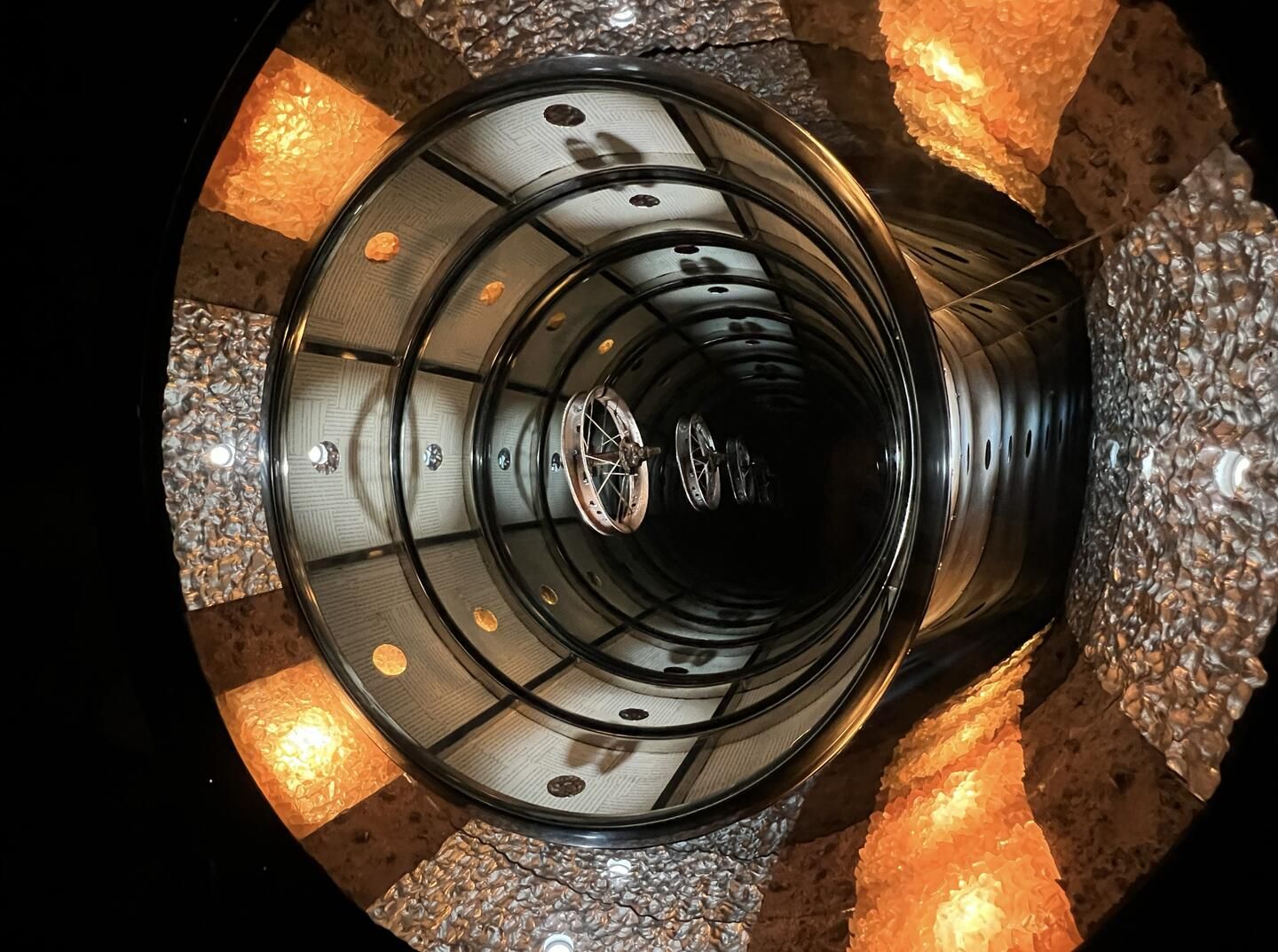 Mark Justiniani, Wormholes (close-up), 2024. Mixed media installation, LED bulbs, mirror, lightbox, 228.6 x 152.4 x 25.4 cm. Courtesy: the artist and The Drawing Room
