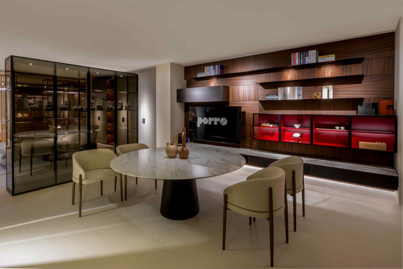The Porro Materic dining table features a calacatta oro marble top with a built-in rotating tray and a black stained ash base (Photo: Bonnie Yap Photography)