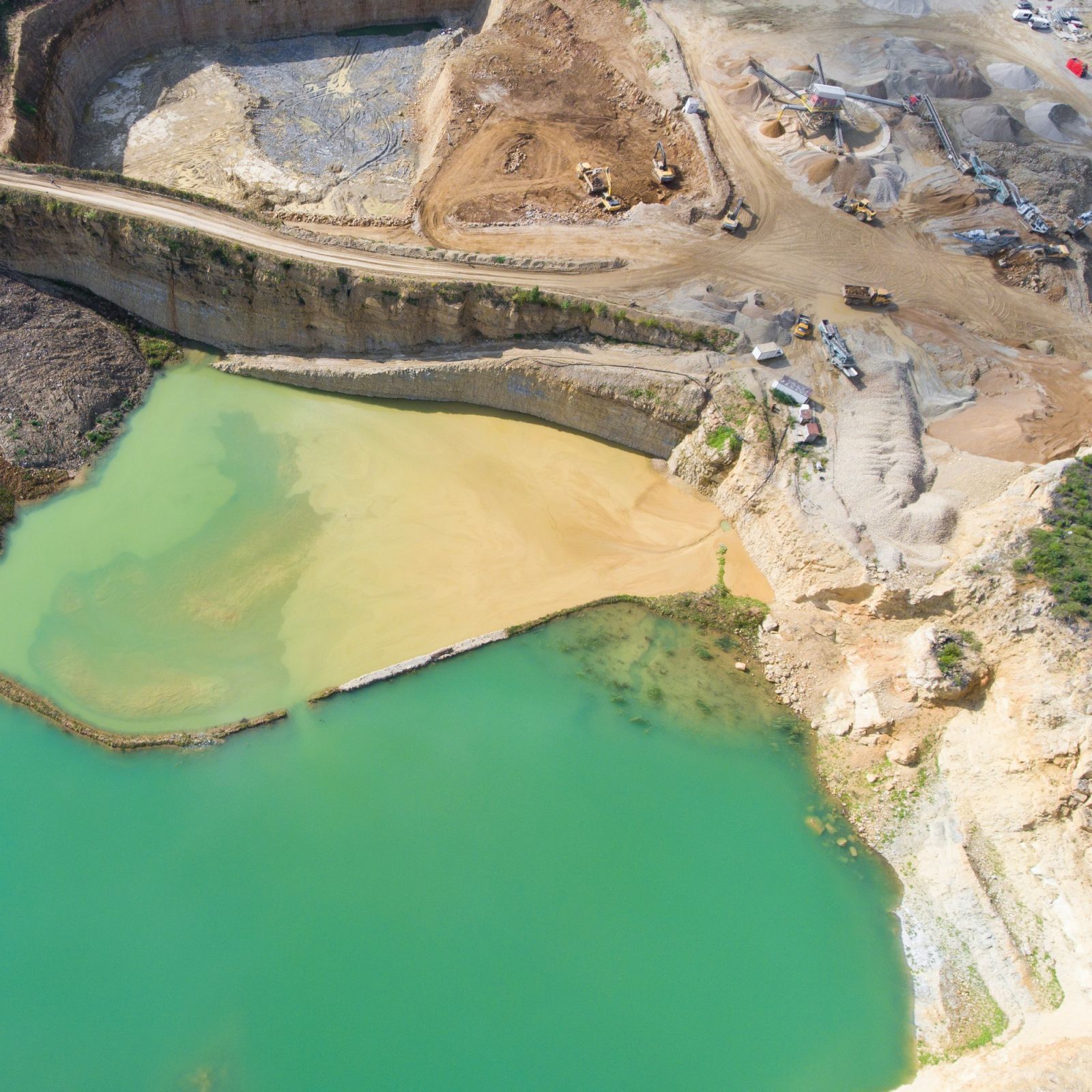 Mining quarry with special equipment, open pit excavation. (Photo: Curioso Photography/Unsplash)