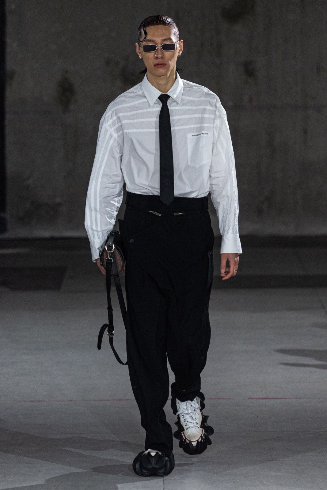 PARIS, FRANCE - JANUARY 18: A model walks the runway during the Feng Chen Wang Ready to Wear Fall/Winter 2024-2025 fashion show as part of the Paris Men Fashion Week on January 18, 2024 in Paris, France. (Photo by Victor LOCHON/Gamma-Rapho via Getty Images)