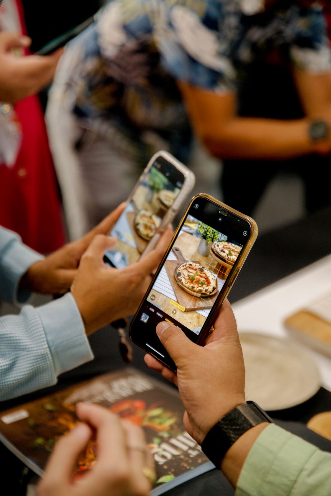 Attendees trying their hand at food photography