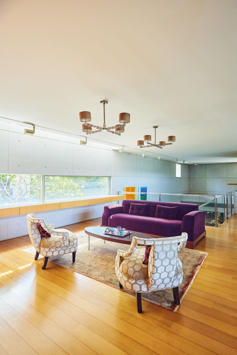 The furniture in the second-floor living room was retained from Ferrand’s first iteration of the interiors