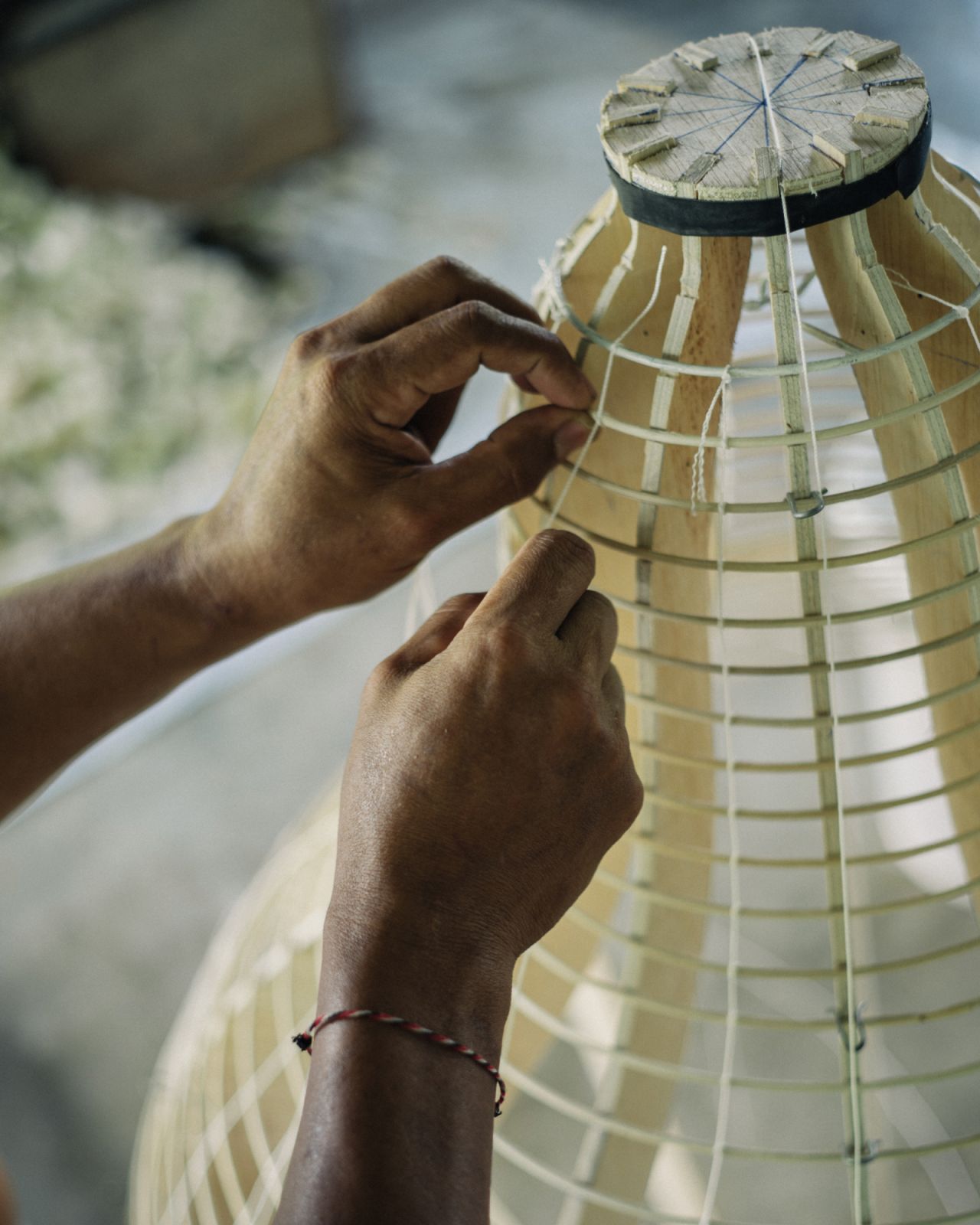 The hands-on craftsmanship behind banana-fibre paper (Photo: Goy Architects)