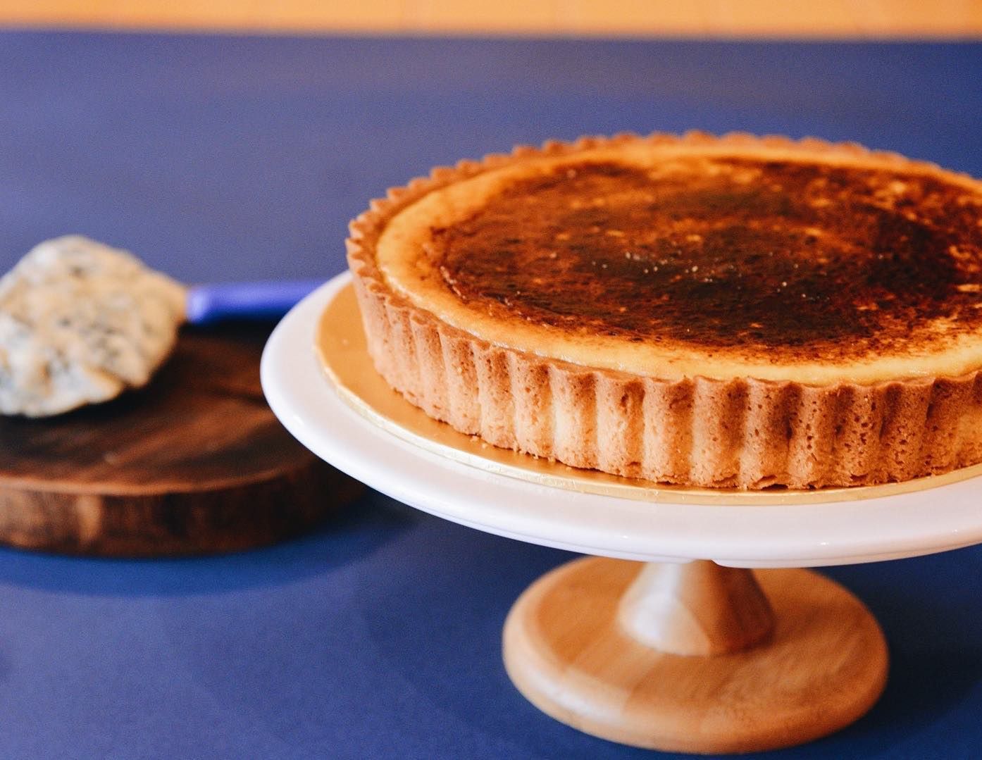Quiec by Olivia’s signature cheesecquiec with savory-sweet blend of cream cheese and blue cheese with a caramelized scorched top and a crunchy almond sable base (Photo: Queic by Olivia)
