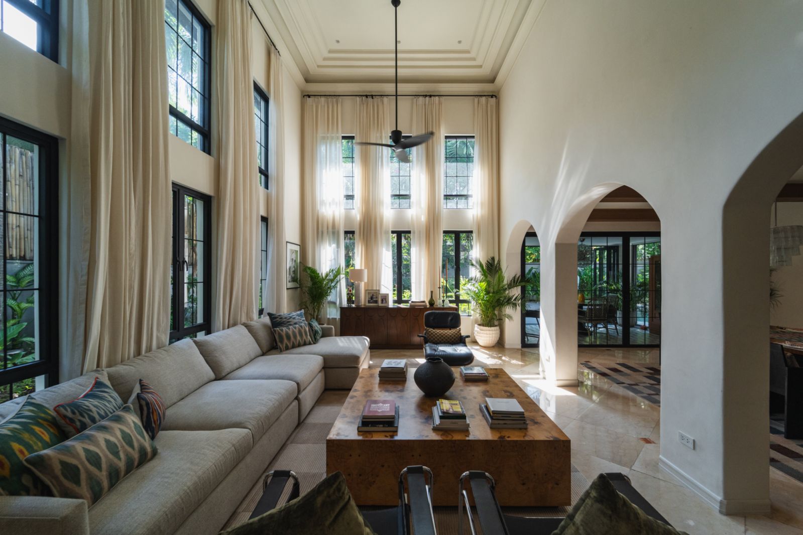 The living room with natural light illuminating the space
