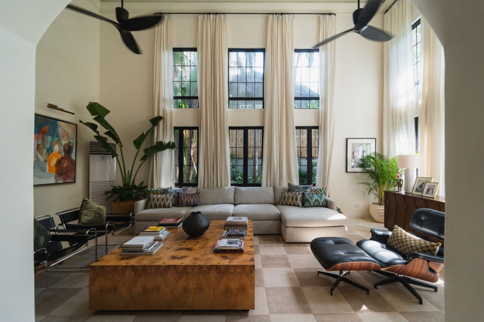 The living room of the Sorra House in Manila, which features natural light illuminating the space