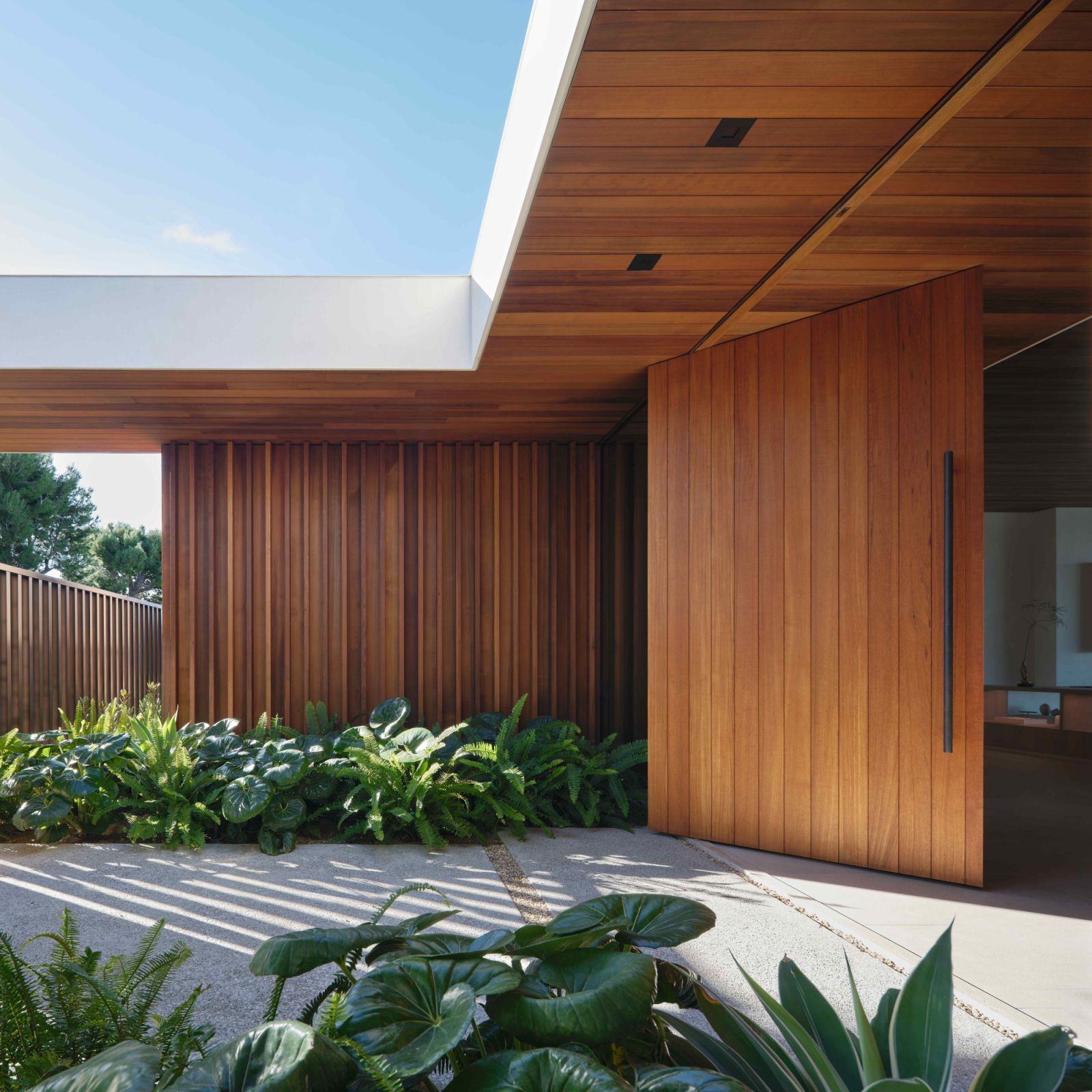 A series of internal and external garden courtyards surround the home