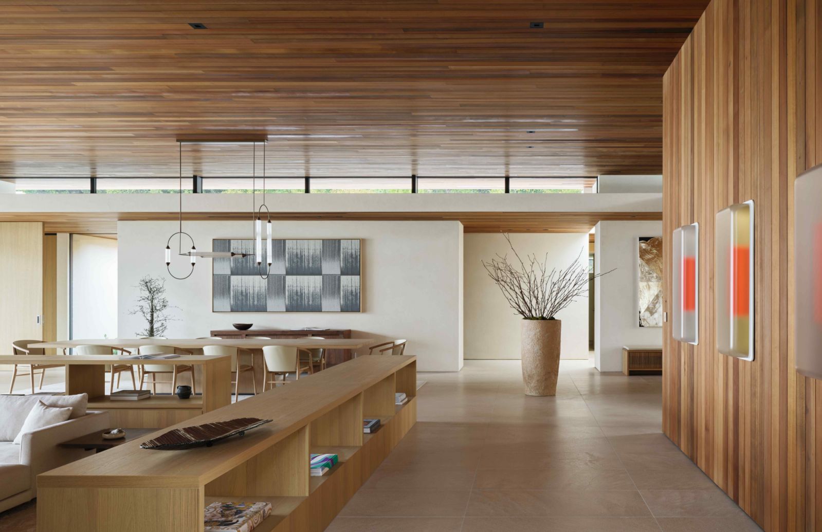 The large, focal vessel in the entryway grounds the space and sets the tone for the home's design narrative