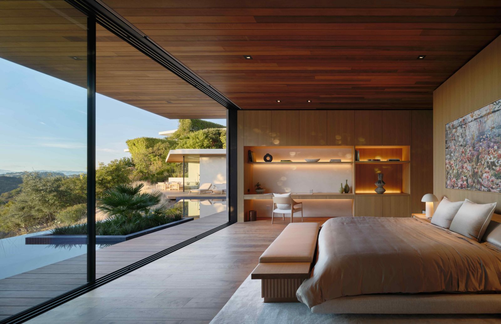 The primary suite maximises on the afforded rear views