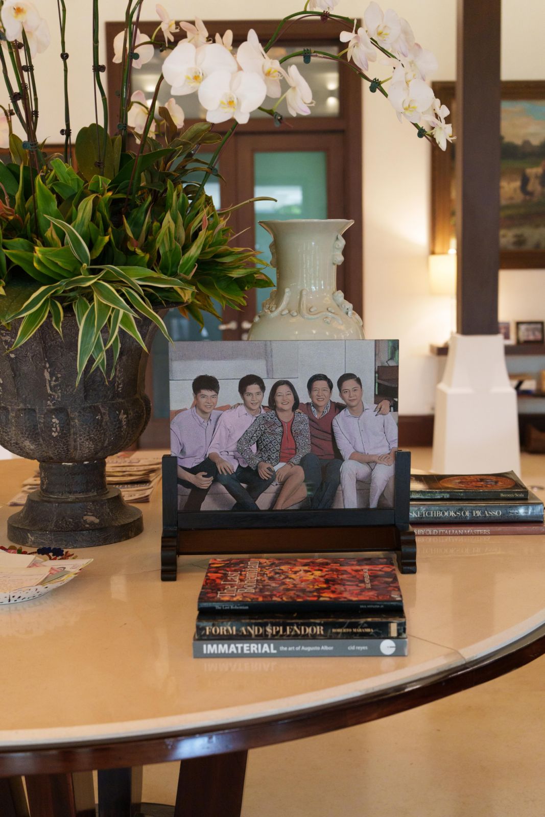 Family portraits are endearingly scattered throughout the property (Photo by Ian Santos)