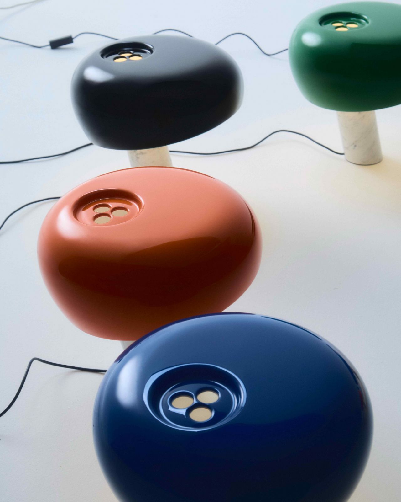 Three cooling holes reminiscent of a bowling ball’s grip