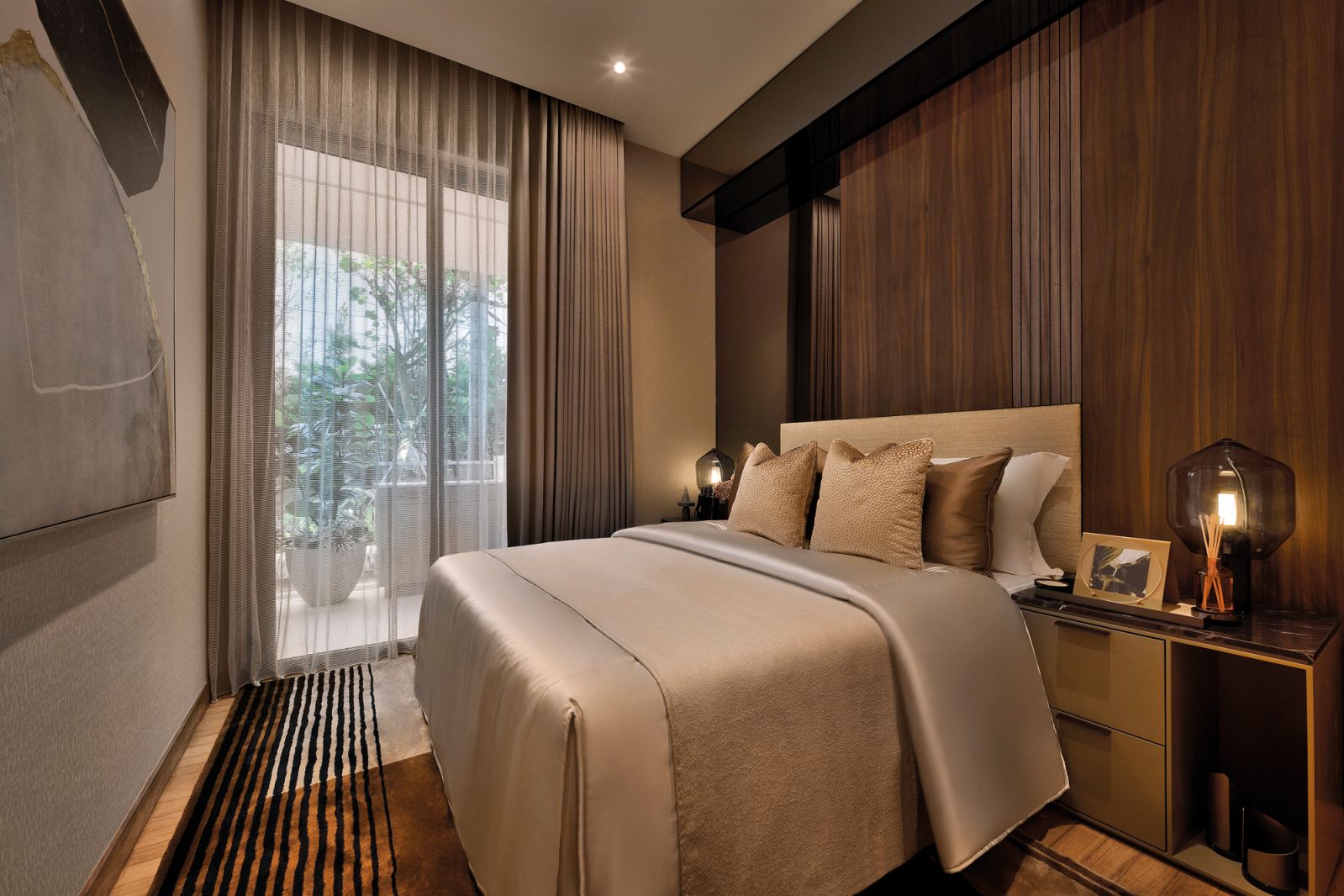 This bedroom is dressed in elegant earthy hues