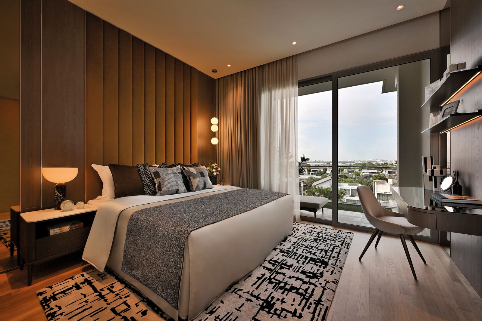A medley of upholstery choices amplifies comfort in the master bedroom