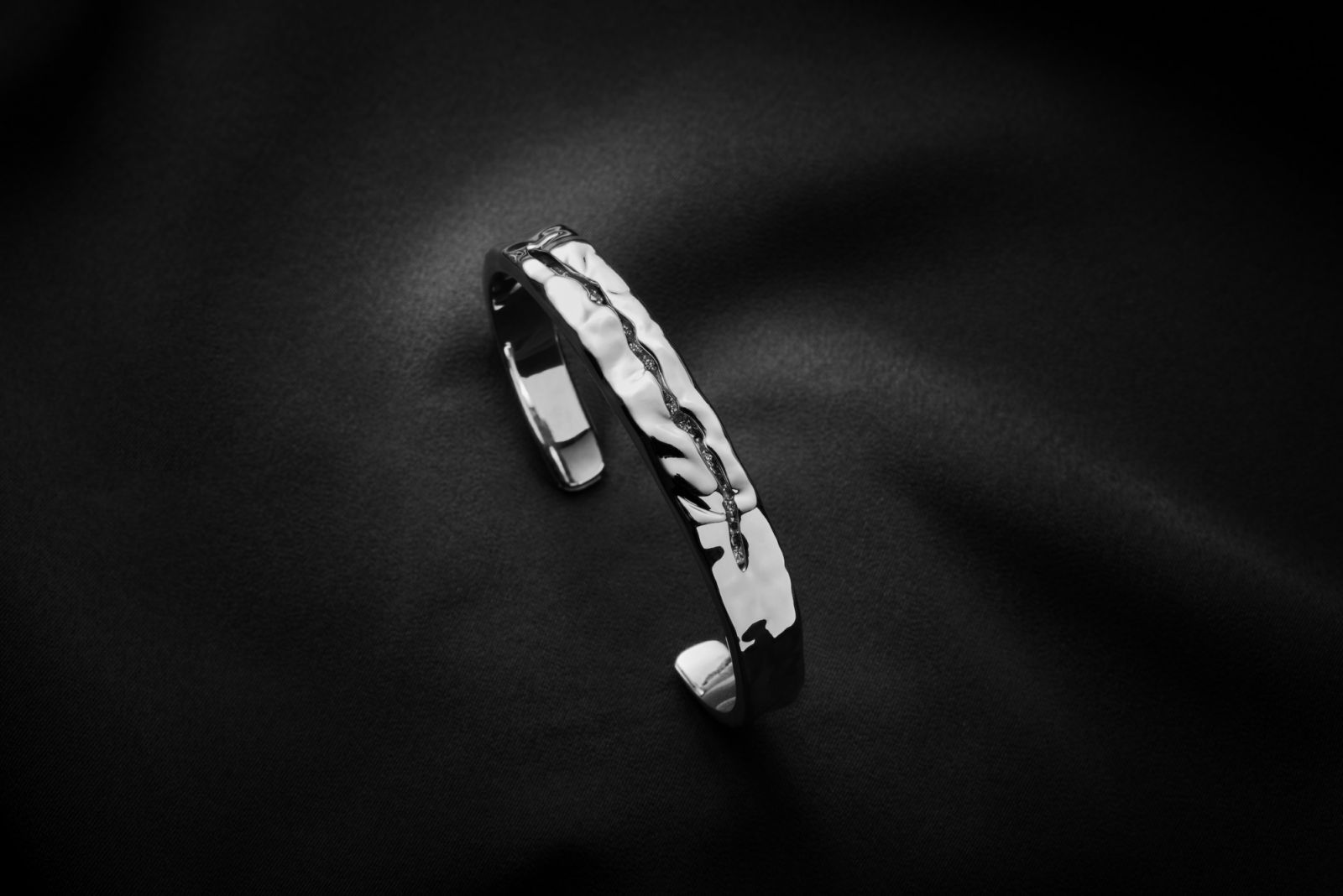 Pat Law designs a bangle with hidden symbolism that champions the strength of courage (Photo: Twomorrow Jewellery)