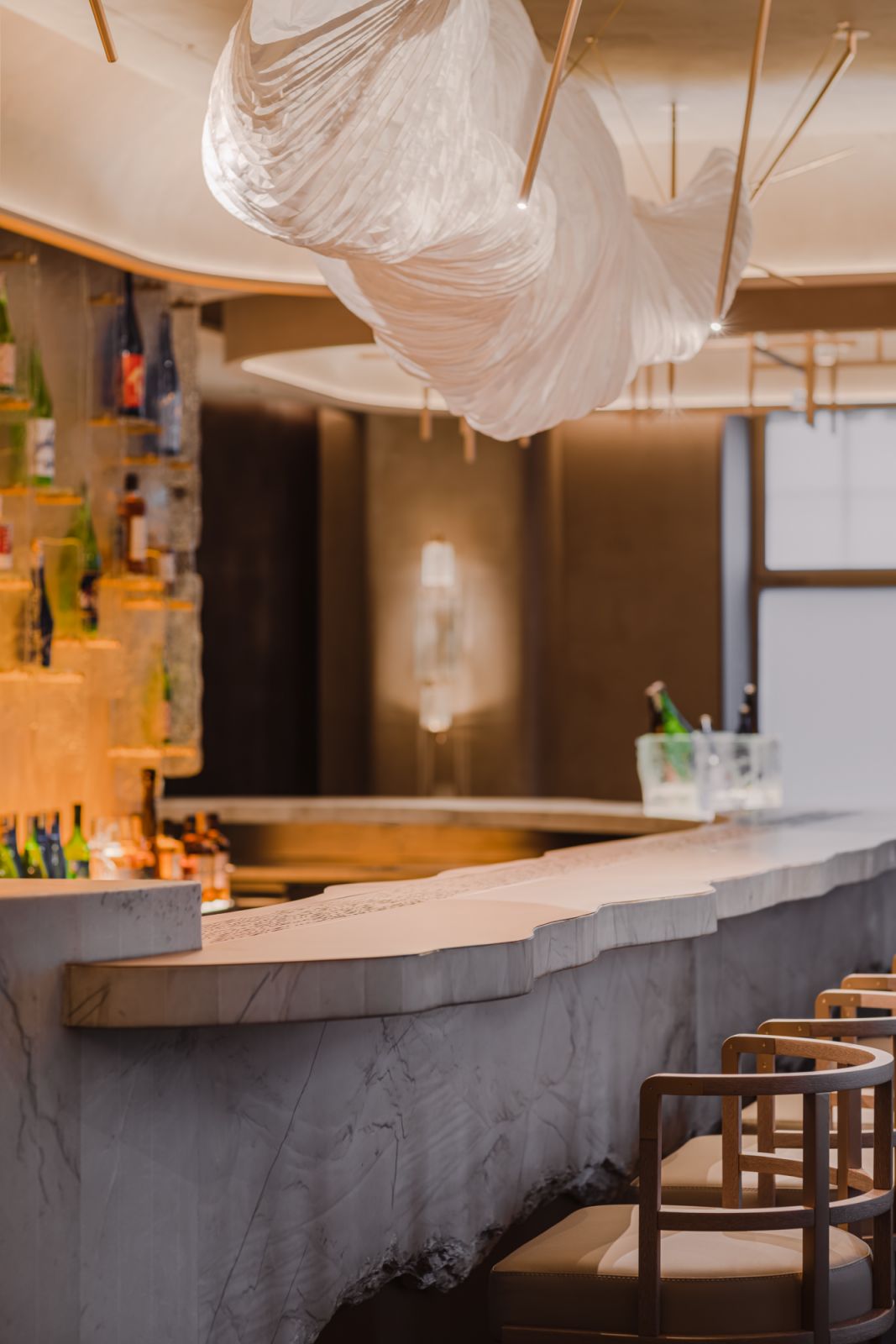 Brushed oak and concrete at the sake bar (Photo: Nobu Hotel Warsaw)