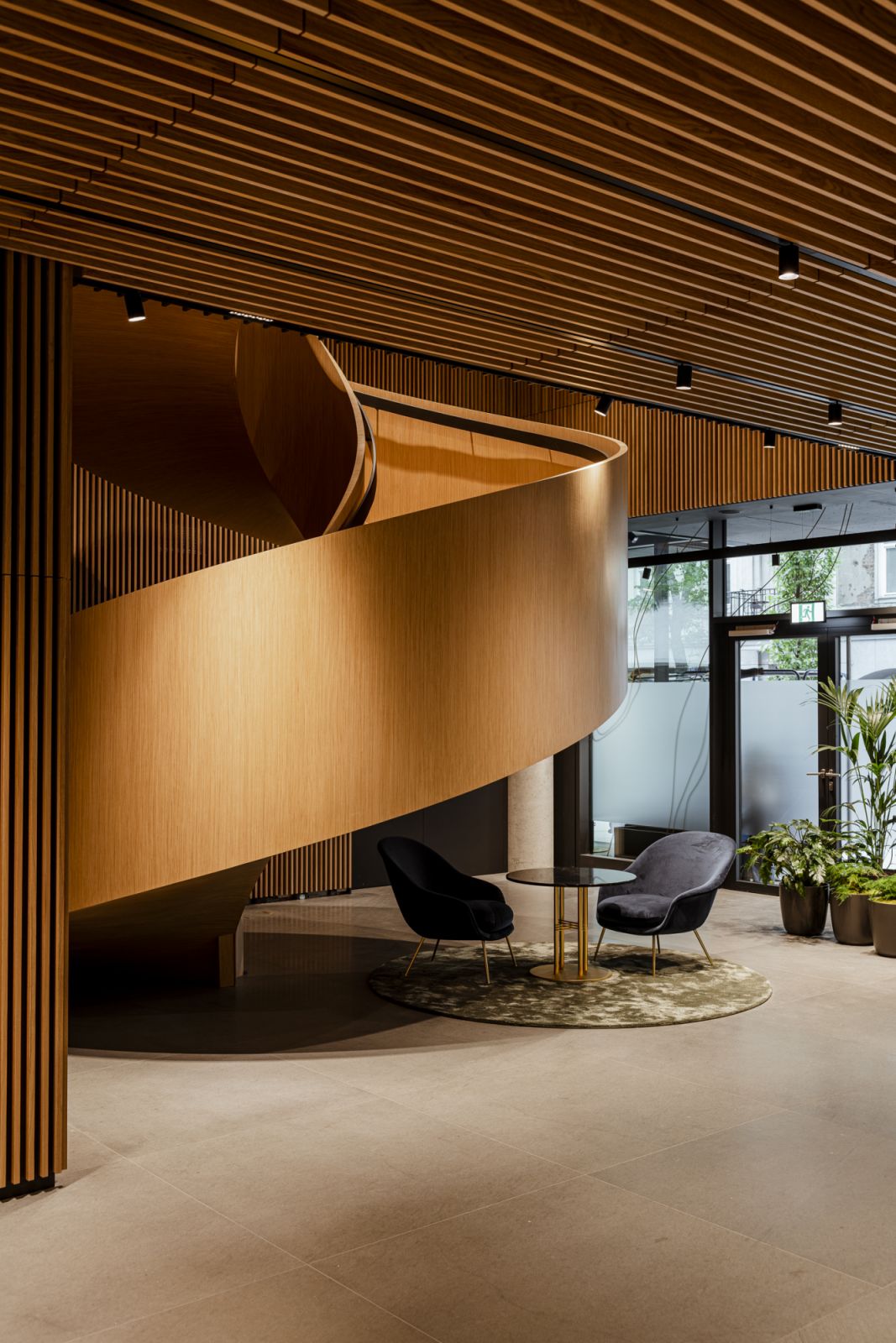 The dramatic wooden spiral staircase in the lobby (Photo: Nobu Hotel Warsaw)