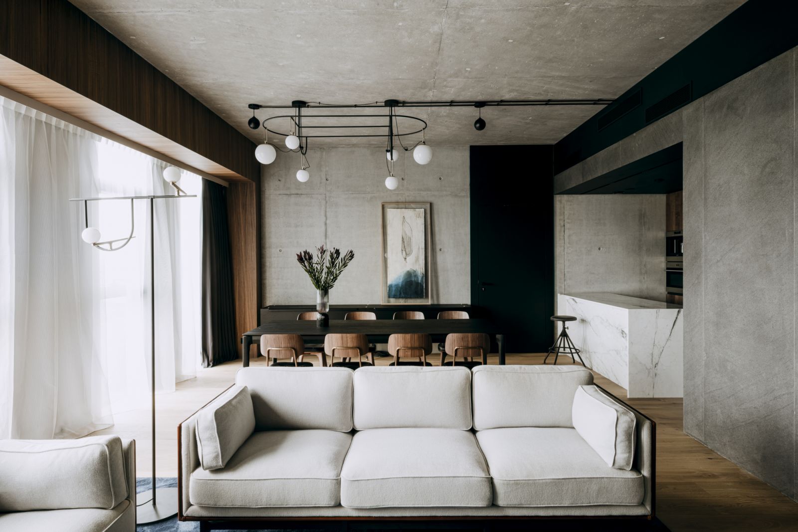 Exposed concrete balanced with light-coloured natural oak (Photo: Nobu Hotel Warsaw)