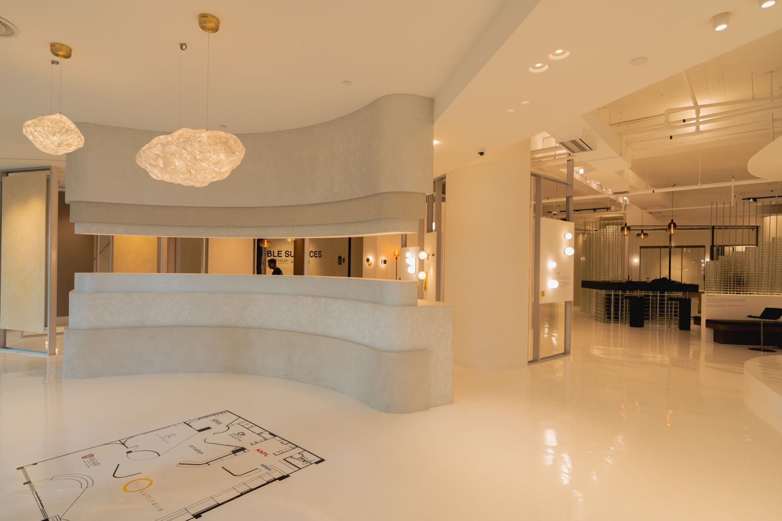 The lighting design at Rooms by Sol Luminaire elevates the shopping experience
