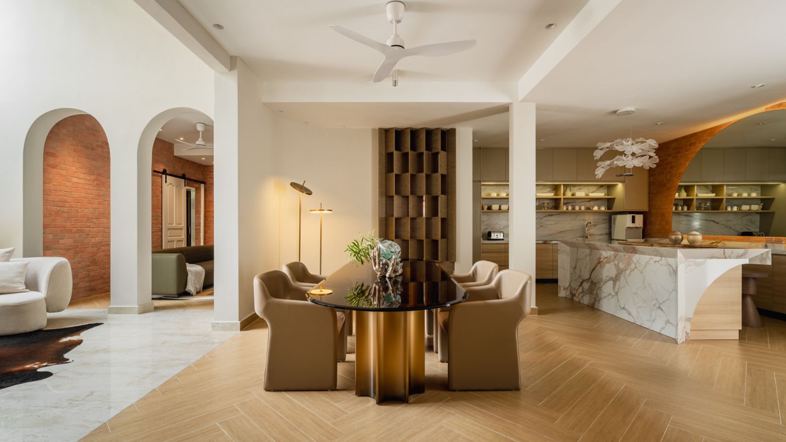 Cleverly combined materials and colours imbue the home with an alluring glow