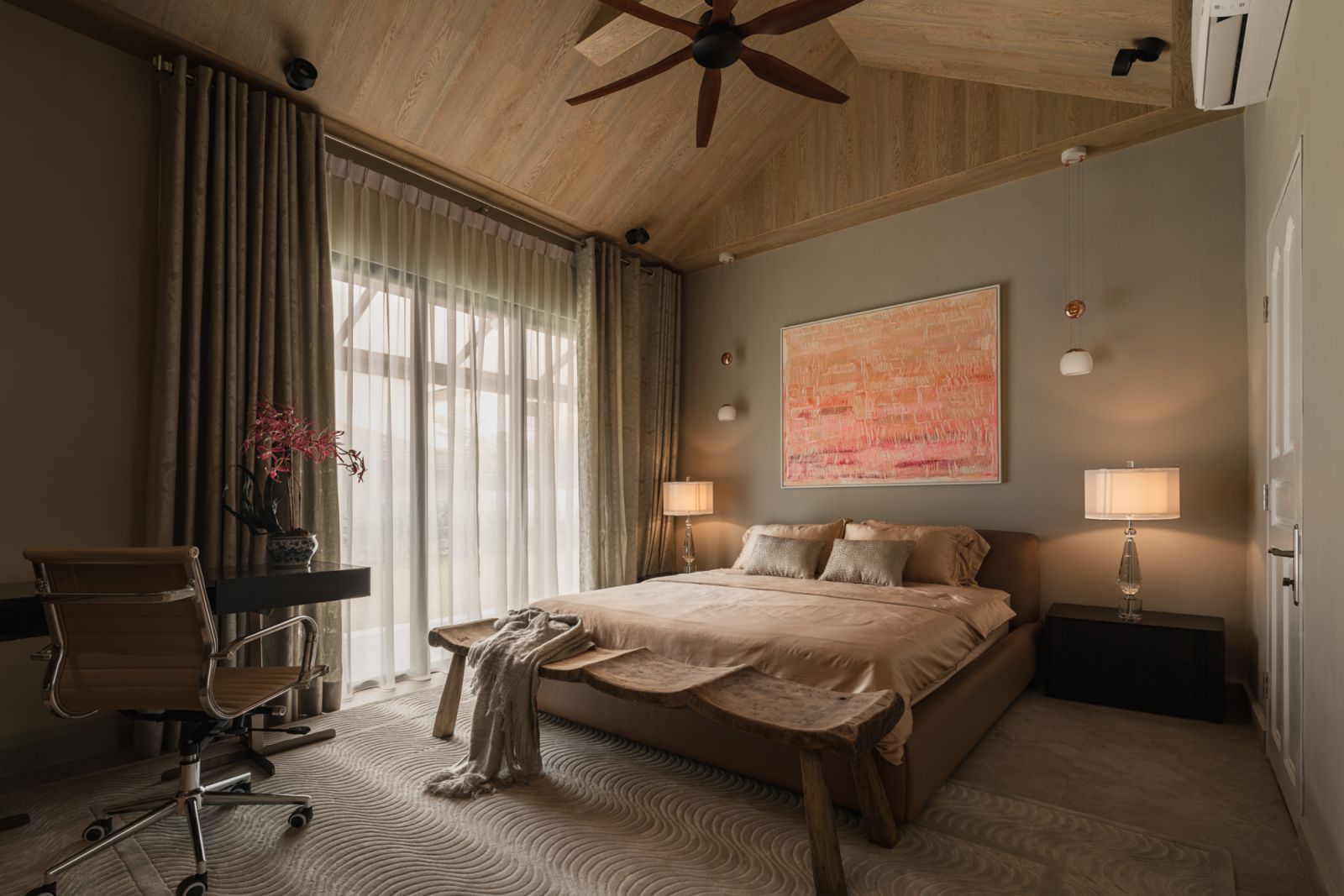 Details like wooden paneling on the pitched roofs warm up the bedroom