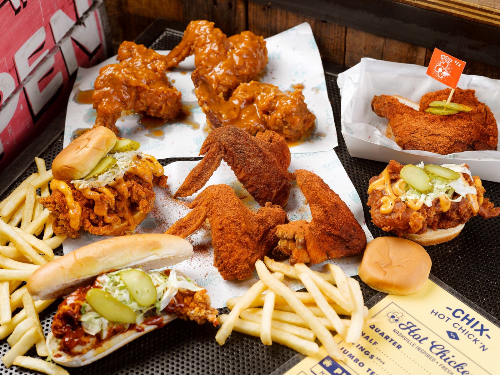 A table spread at Chix Hot Chicken (Photo: Facebook/Chix Hot Chicken)