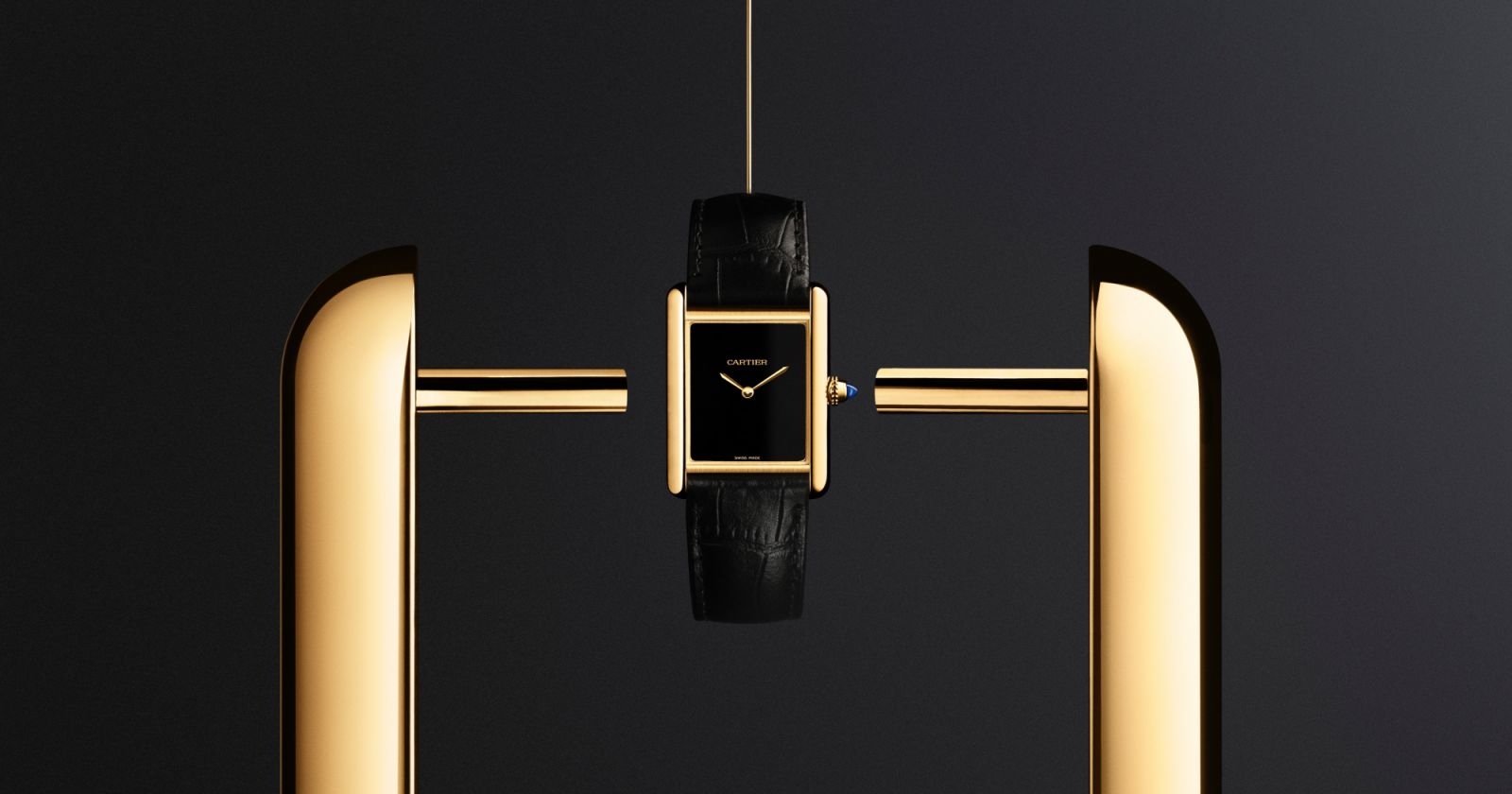 Tank Louis Cartier黃K金腕錶。(Photo: Cartier)
