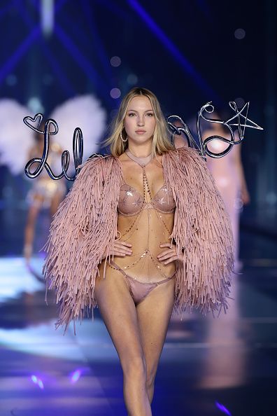 NEW YORK, NEW YORK - OCTOBER 15: Lila Moss walks the runway for the Victoria's Secret Fashion Show 2024 on October 15, 2024 in New York City. (Photo by Dimitrios Kambouris/Getty Images for Victoria's Secret)