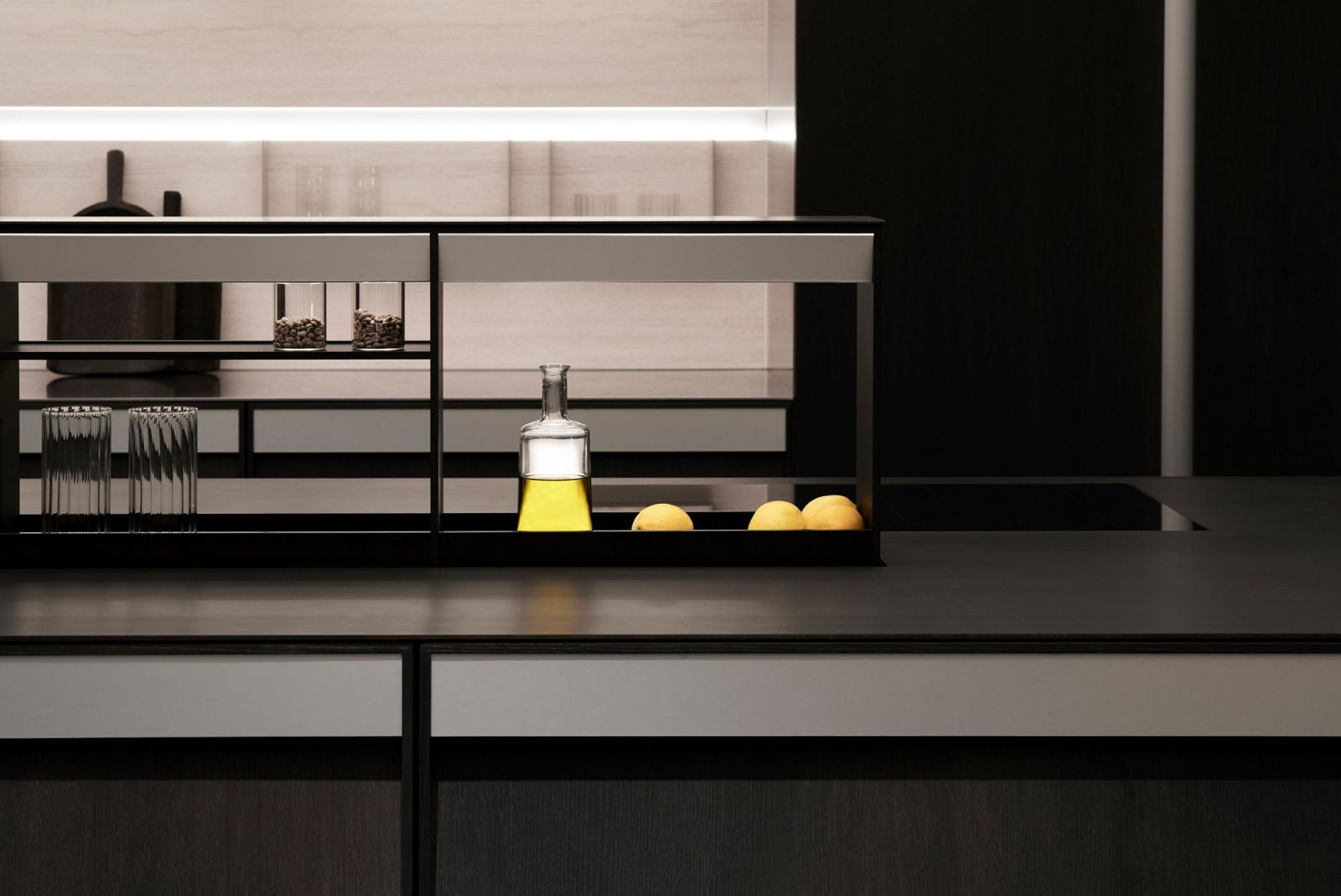 The sultry and sleek-lined dark oak finishes in the Poggenpohl Beauphoria kitchen