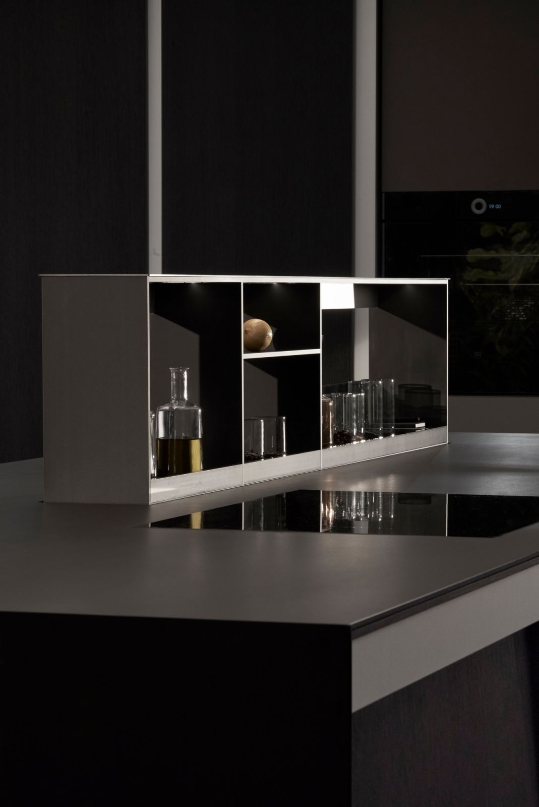 Poggenpohl’s Beauphoria kitchen concept in dark oak, imbued with the brand’s latest innovative kitchen technology