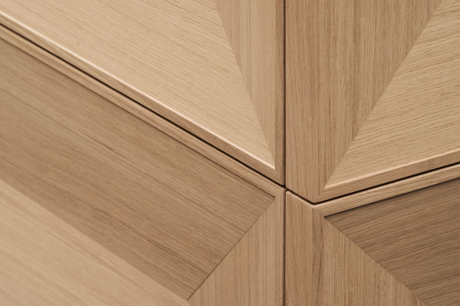 Detailed hand-finishing defines the light oak Beauphoria kitchen
