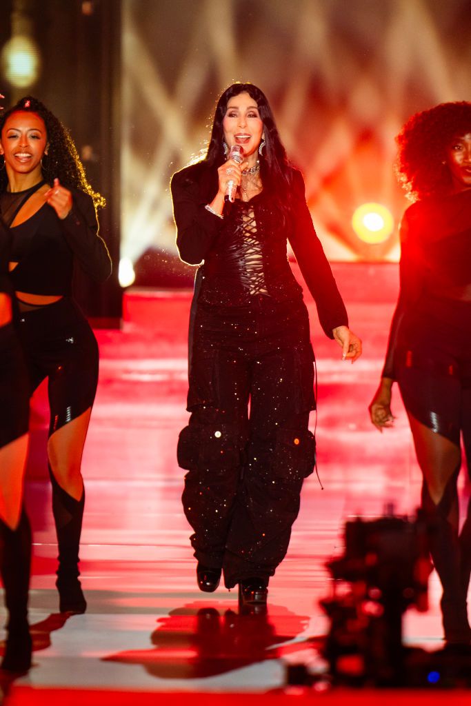 BROOKLYN, NEW YORK - OCTOBER 15: Cher performs during the Victoria's Secret Fashion Show 2024 at Duggal Greenhouse on October 15, 2024 in Brooklyn, New York. (Photo by TheStewartofNY/FilmMagic)