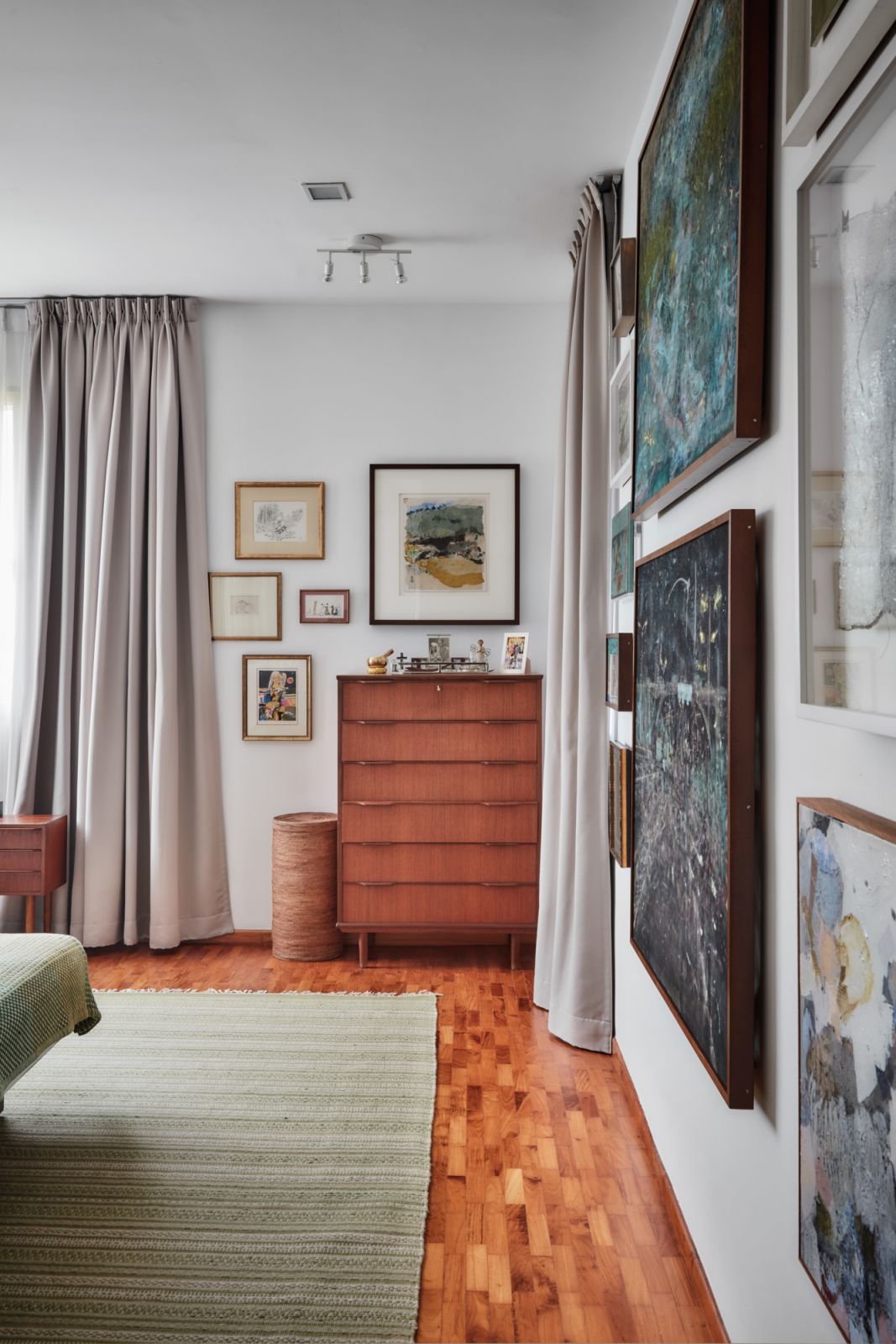 More of the couple’s artwork displayed in the bedroom