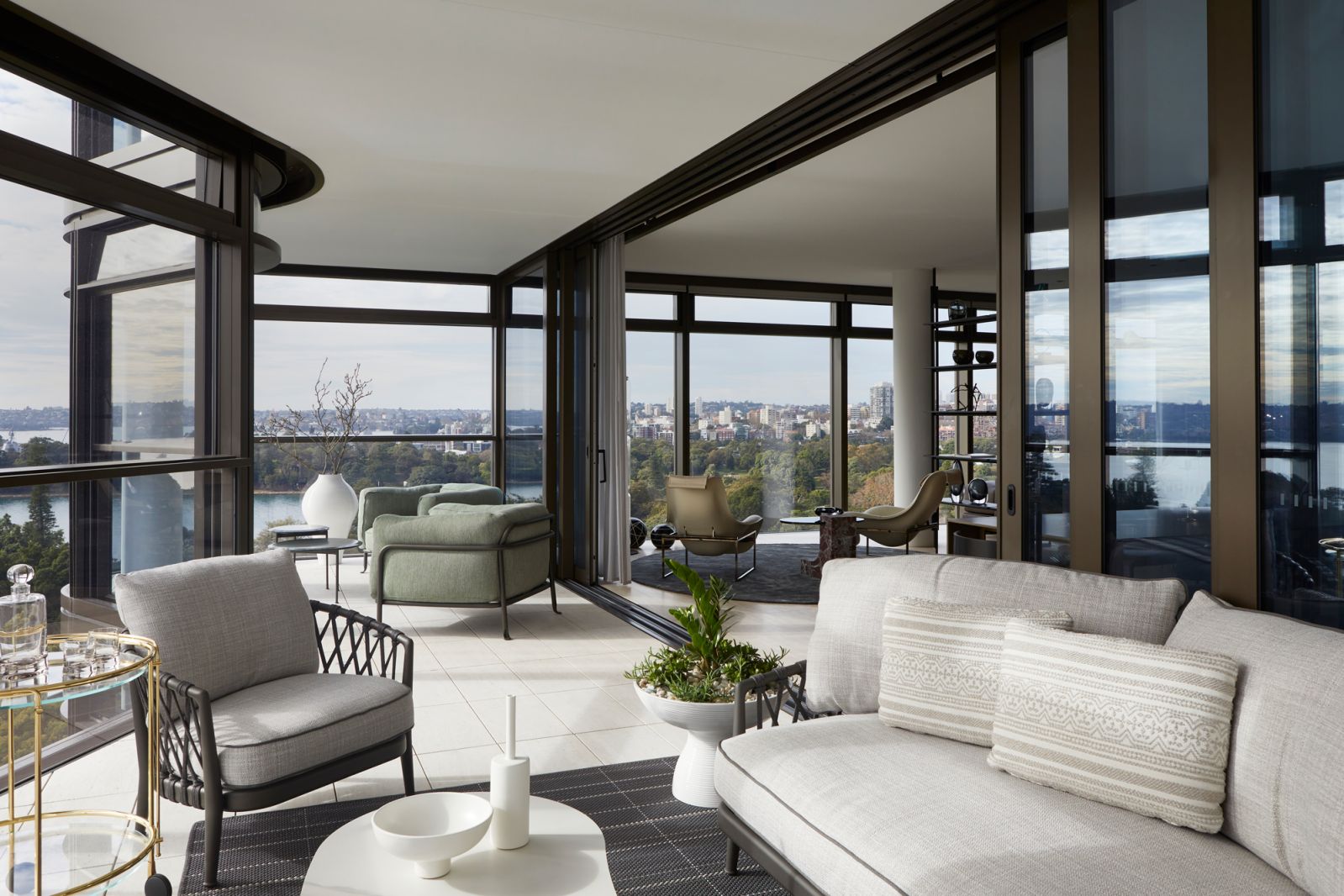 The glass-enclosed spaces in the Opera Residence feel airy yet intimate