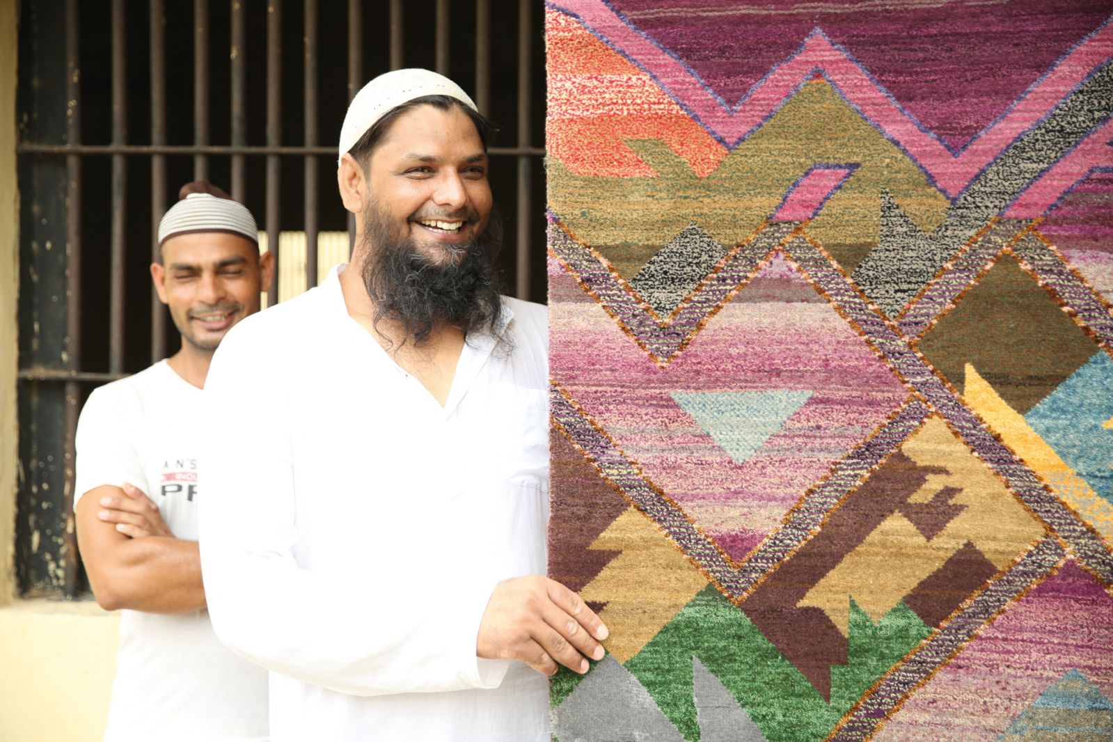 Two of the artisans behind Jaipur Rugs