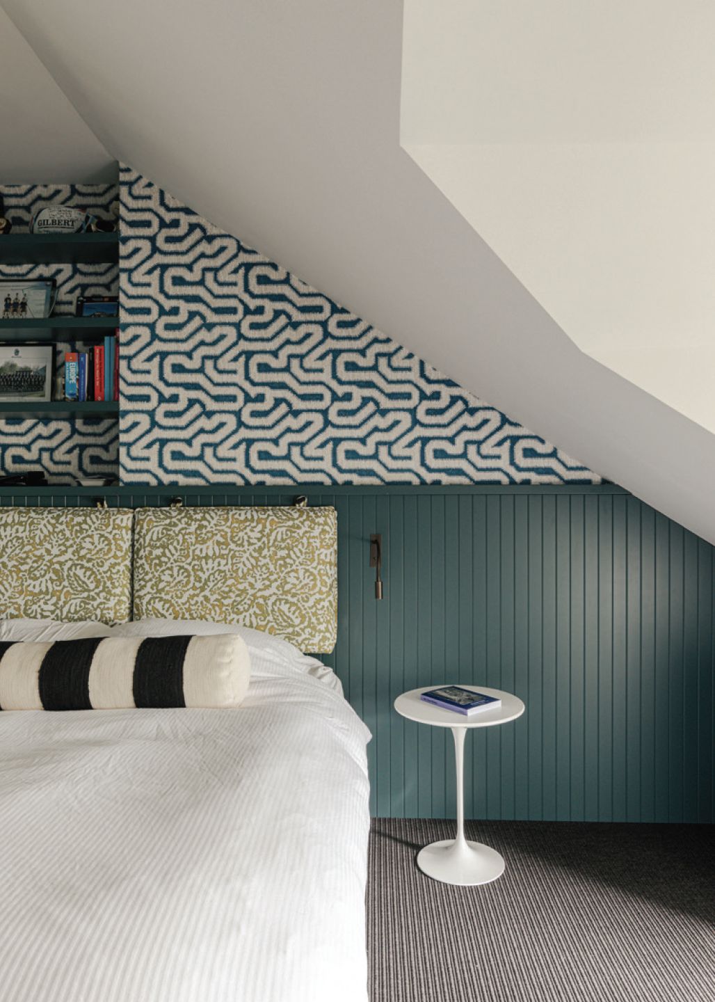 The loft bedroom with handprinted Albaicin wallpaper from Rapture & Wright