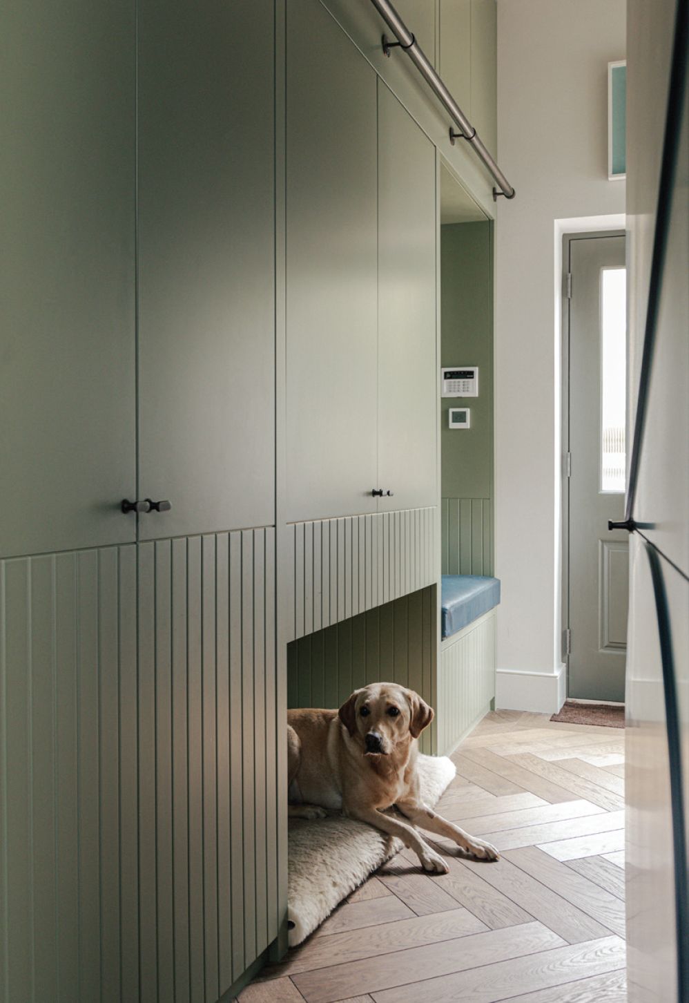 The boot room, with a nook for Lexi to curl up in