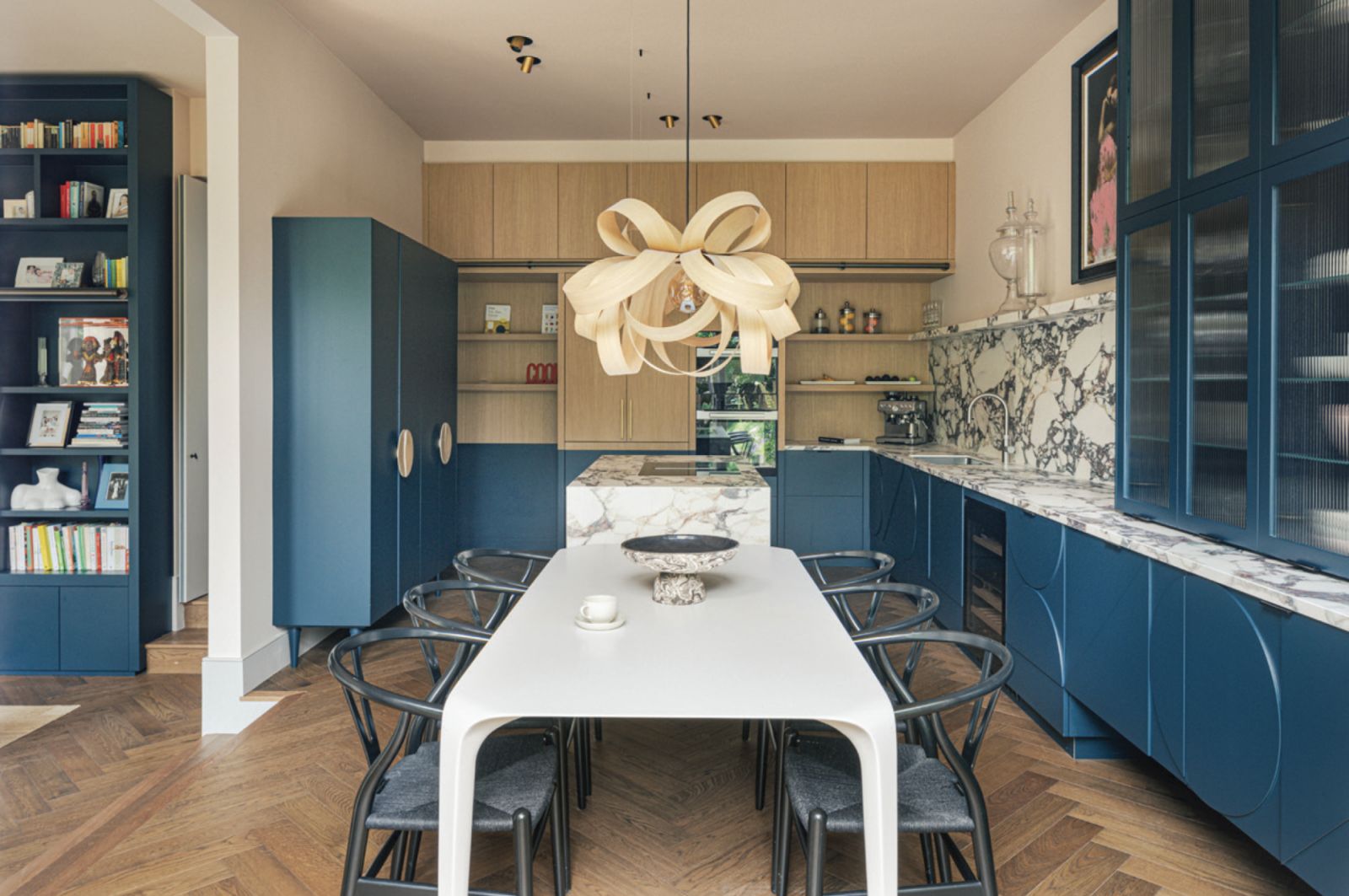 The dining room that leads into the kitchen