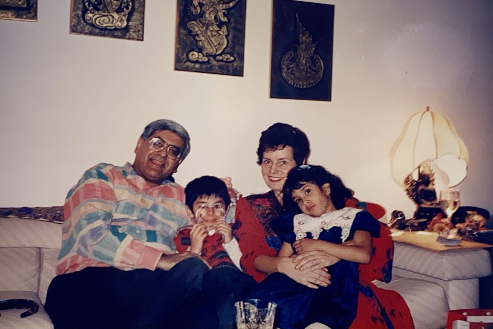 A family photo which features Thomson-Sakhrani, his parents and sister (Photo: James Thomson-Sakhrani)