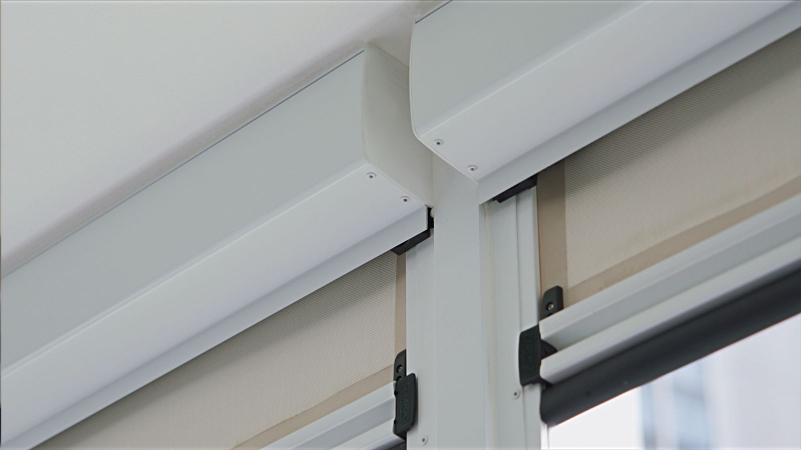 A close-up of the Australian track-guided system at the heart of Ziptrak Outdoor Blinds