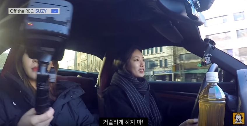 Bae Suzy cruising in what she calls her dream car, the Porsche 911, in an episode of ‘Off The Record’ (Photo: Twitter/@JYPETVVICE)