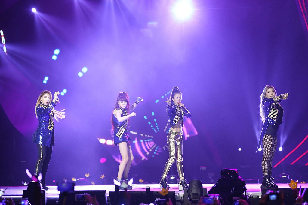 HONG KONG - DECEMBER 02: (CHINA OUT) 2NE1 perform on the stage during the 2015 Mnet Asian Music Awards (MAMA) at AsiaWorld-Expo on December 2, 2015 in Hong Kong, China. (Photo by Visual China Group via Getty Images/Visual China Group via Getty Images)
