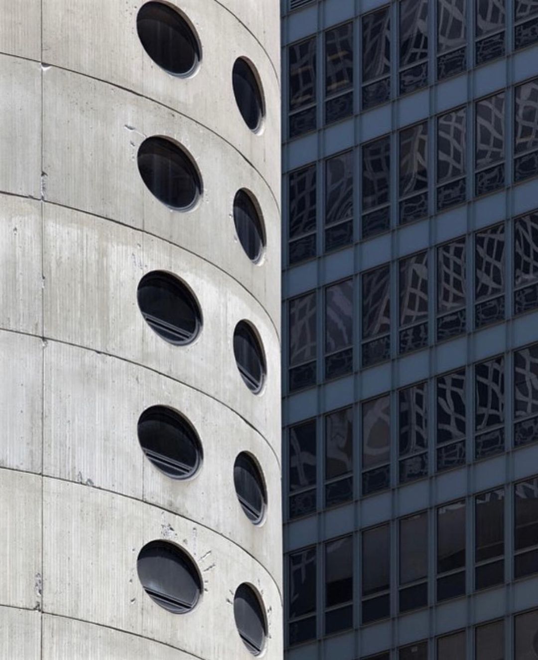 Concrete exterior with circular windows (Photo: Instagram / @haus_oft)