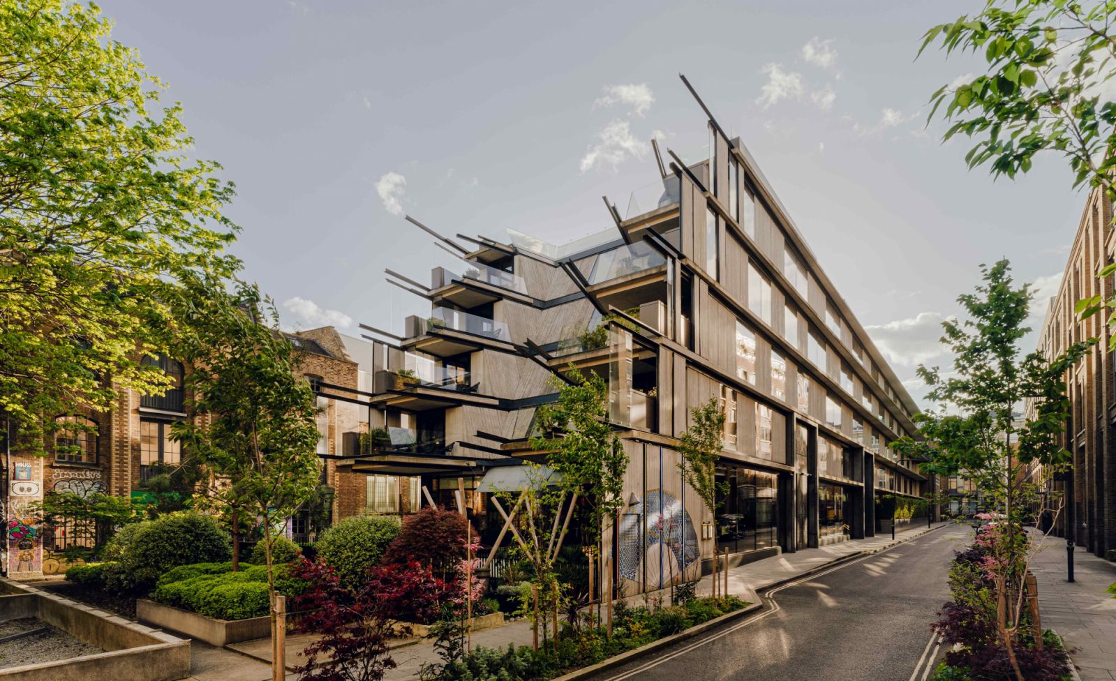 The façade creates a harmonious dialogue with the surrounding context (Photo: Nobu Hotel Shoreditch)