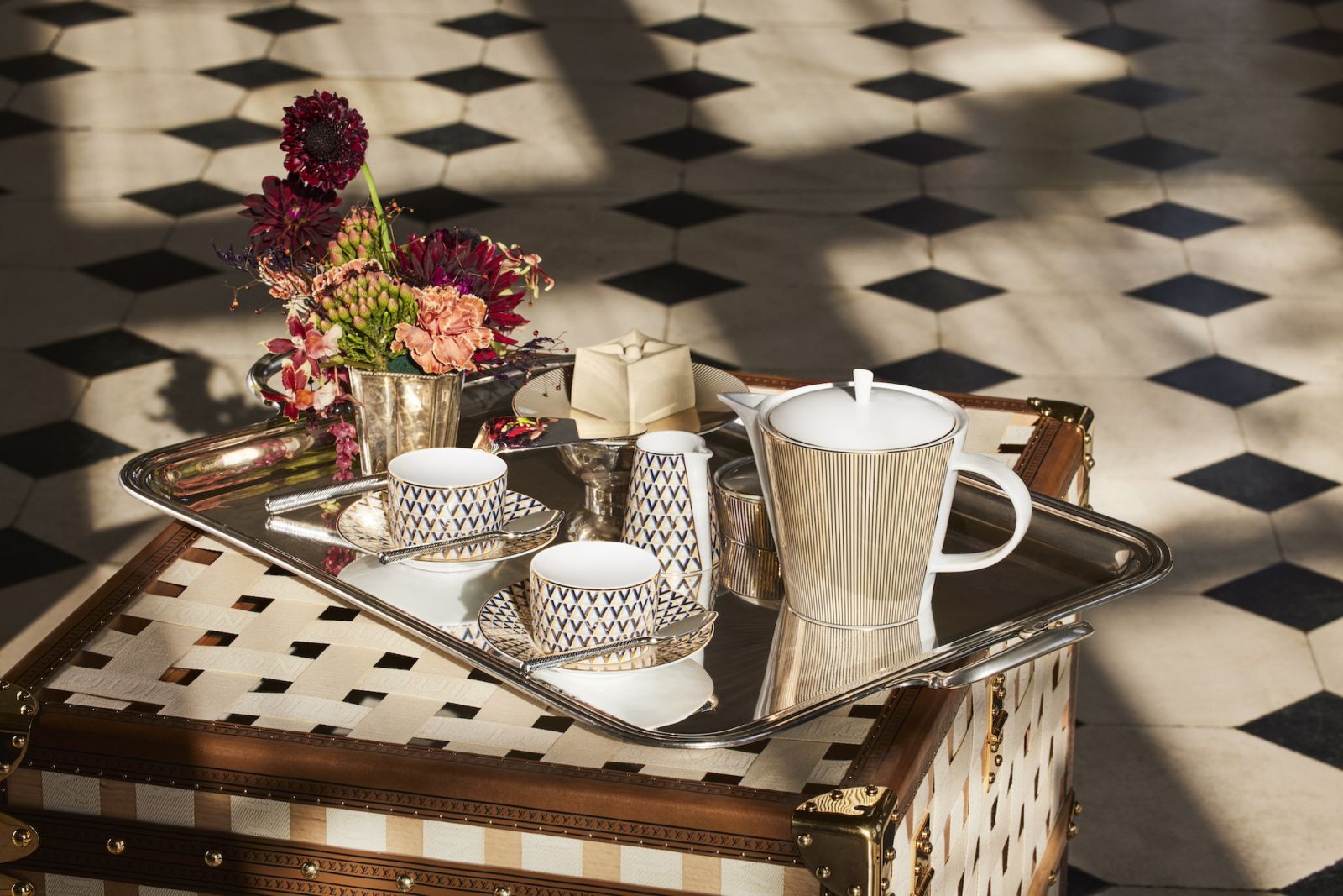 The pieces showcase a two-tone theme enhanced with gold which heighten the movement of the superimposed designs