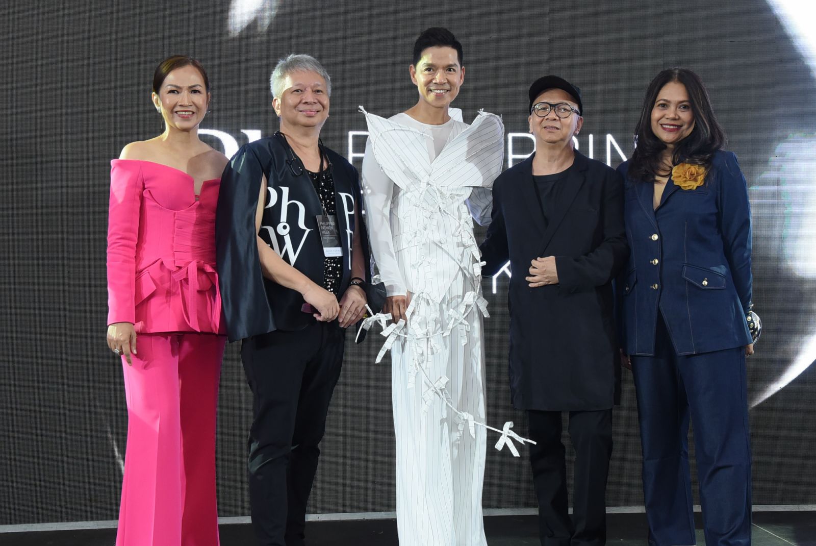 (From left) Philippine Fashion Week chief legal officer Atty. Stephanie Cas-Refina, co-founder Audie Espino, chief vision officer Nikky Nicandro III, co-founder Joey Espino and Amorada chief strategy officer Pris Santos (Photo: Courtesy of Fuentes Manila)
