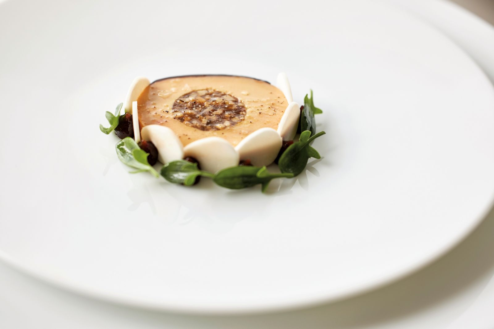 Duck foie grass slow poached with chicken leg and soy sauce at Sézanne
