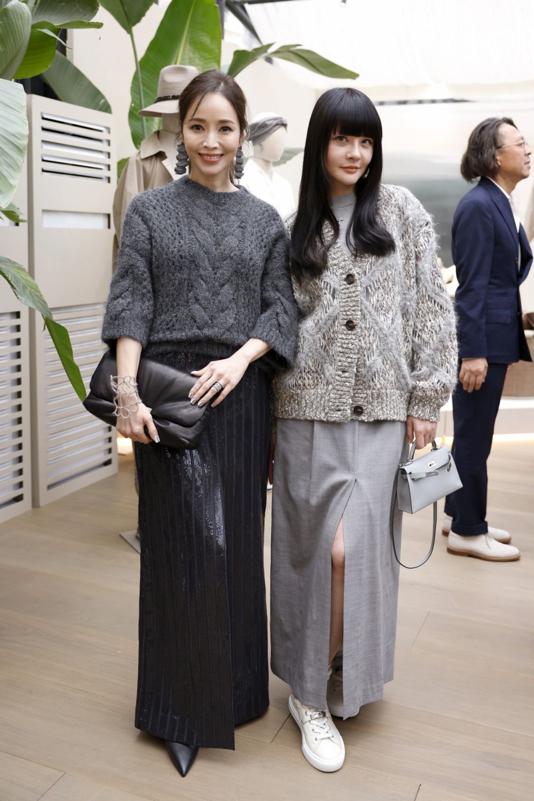 MILAN, ITALY - SEPTEMBER 18: Patty Hou and a guest attend the presentation of the Brunello Cucinelli Spring Summer 25 Women's Collection during the Milan Fashion Week Spring/Summer 2025 on September 18, 2024 in Milan, Italy. (Photo by Claudio Lavenia/Getty Images for Brunello Cucinelli)