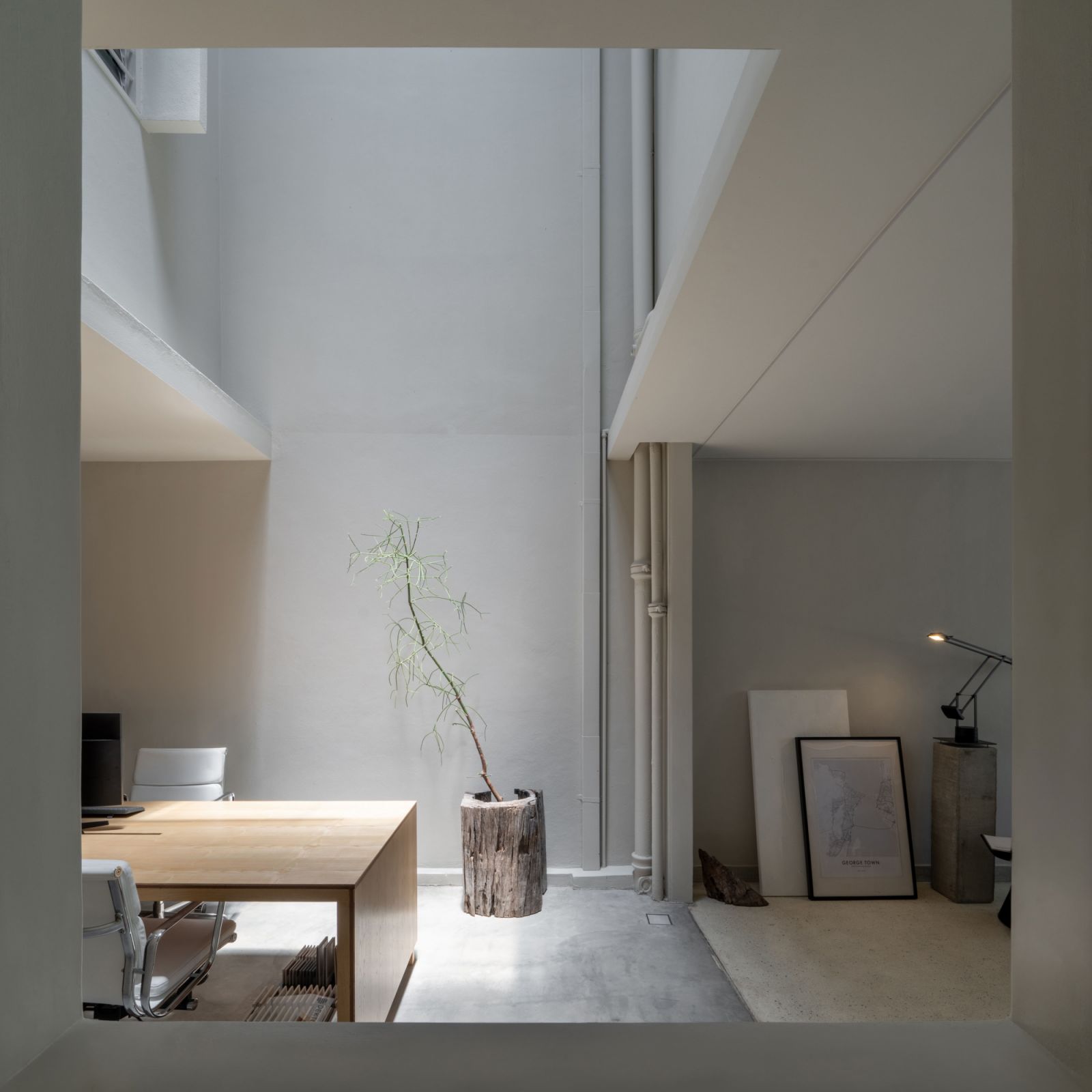 The central air well bathes the interiors with natural light